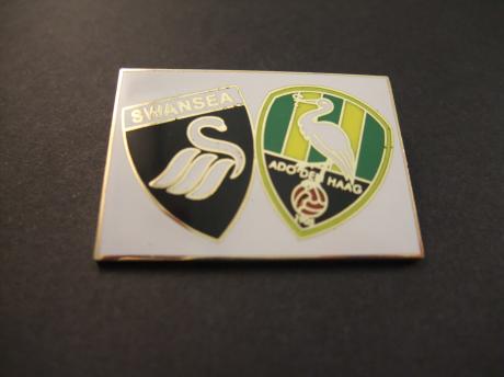 Swansea City- ADO Den Haag logo's samen  wit